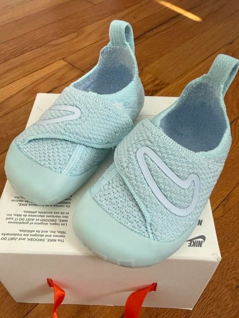 Nike Light Blue Knit Slip-On Sneakers